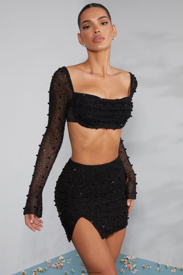 Spódnica mini Belle \'le z wysokim stanem i rozcięciem na udzie 2FZ0T750 czarny Oh Polly