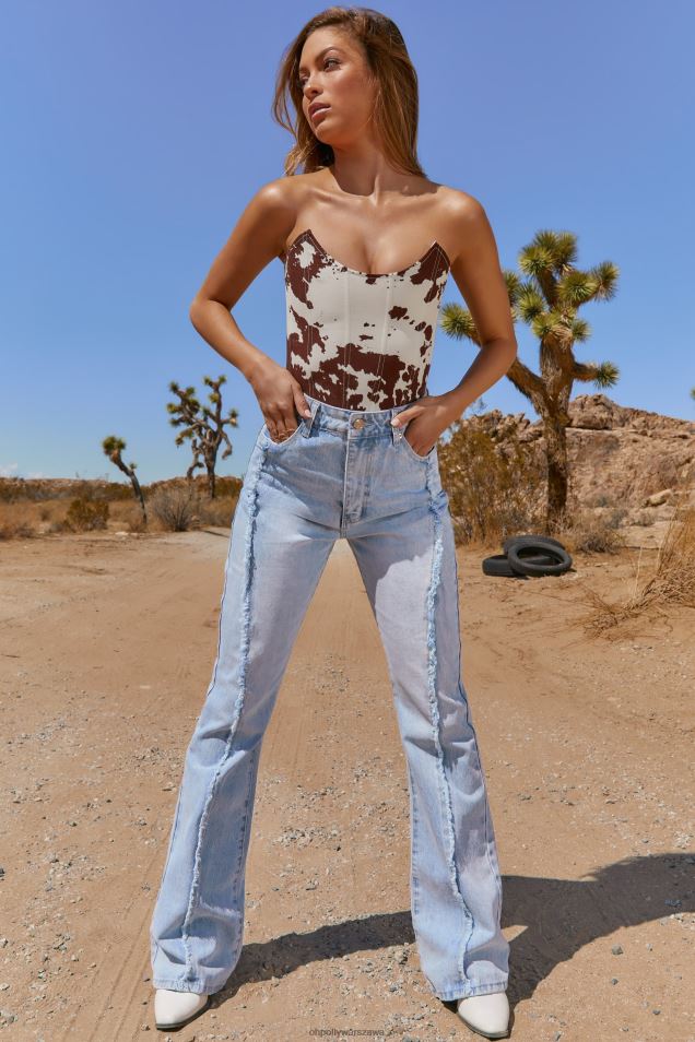 Dżinsy z przetarciami i rozszerzanymi nogawkami 2FZ0T840 jasnoniebieskie pranie Oh Polly