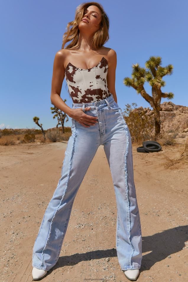 Dżinsy z przetarciami i rozszerzanymi nogawkami 2FZ0T840 jasnoniebieskie pranie Oh Polly